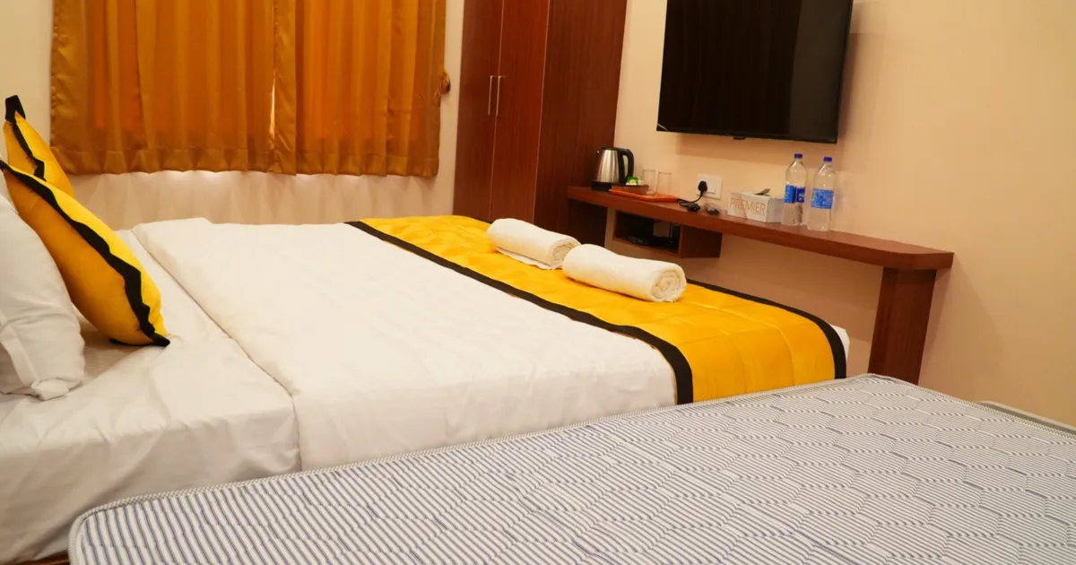 Spacious, clean family room at UJ Pallazzio — a family-friendly hotel near Arunachaleswarar Temple, Tiruvannamalai